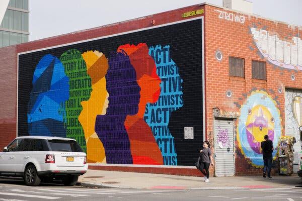 The “Facing Futures” mural in Brooklyn, comprising six nonbinary portraits, was created with six signature colors inspired by the vegetal dyes used in African textiles.