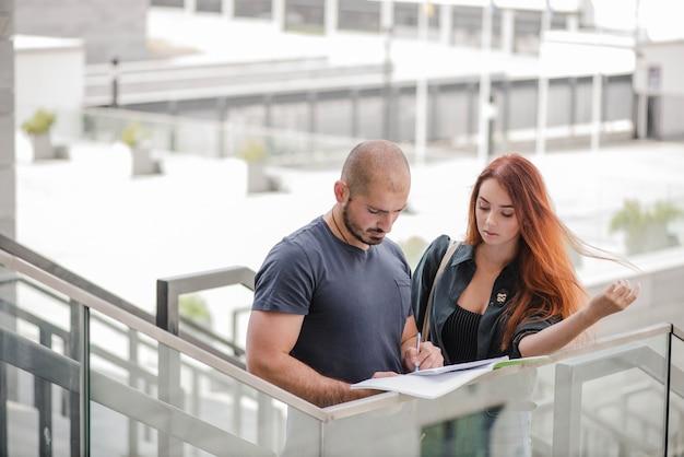 Man and woman with docs together