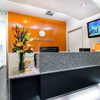 Modern reception area at Dental Excellence featuring a welcoming ambiance, promoting LANAP - Laser Assisted New Attachment Procedure.