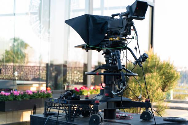 TV NEWS cast outdoors studio with camera and equipment Film Studio, Industry, Studio Shot, Studio - Workplace, Movie  corporate video production  stock pictures, royalty-free photos & images