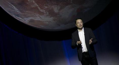 SpaceX founder Elon Musk speaks during the 67th International Astronautical Congress in Guadalajara, Mexico, Tuesday, Sept. 27, 2016. In a receptive audience full of space buffs, Musk said he envisions 1,000 passenger ships flying en masse to Mars, 'Battlestar Galactica' style. He calls it the Mars Colonial fleet, and he says it could become reality within a century. Musk's goal is to establish a full-fledged city on Mars and thereby make humans a multi-planetary species. (AP Photo/Refugio Ruiz)