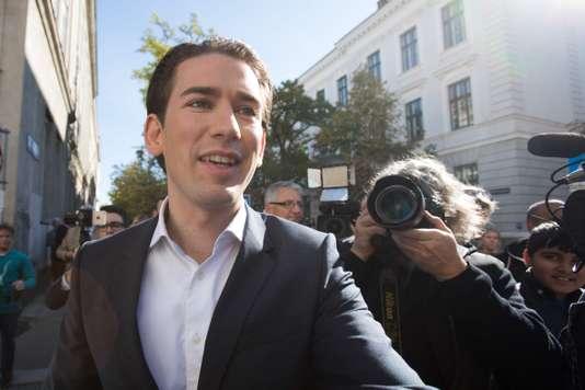Austria's Foreign Minister and leader of Austria's centre-right People's Party (OeVP) Sebastian Kurz leaves a polling station during general elections in Vienna, Austria, on October 15, 2017. Voting began in Austria in a snap election tipped to see conservative Sebastian Kurz, 31, become the EU's youngest leader and form an alliance with the far-right, in the bloc's latest populist test. / AFP / ALEX HALADA