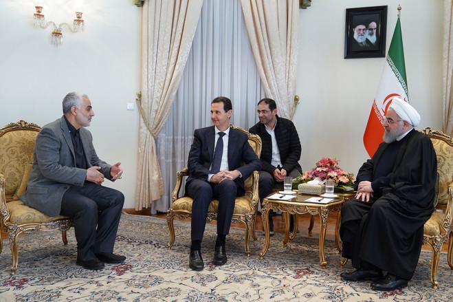 Syrian President Bashar al-Assad, center, during a February meeting in Tehran with his Iranian counterpart Hassan Rouhani, right, and the commander of the Iranian Revolutionary Guard's Quds Force, Gen. Qassem Suleimani.