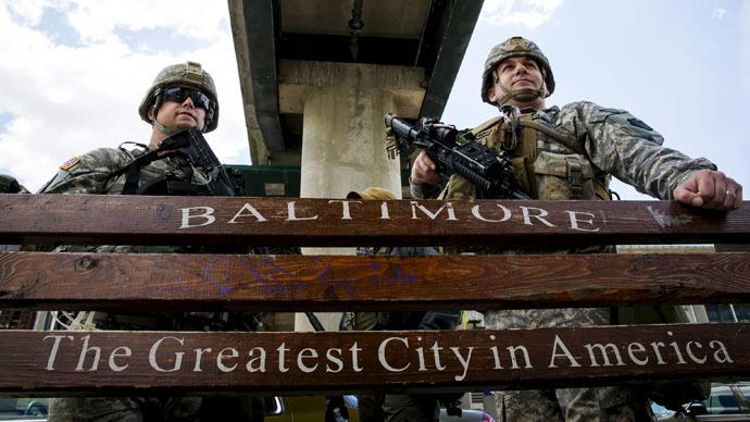 National Guard troops stand watch along E. Pratt St.  in Baltimore, Maryland April 28, 2015. (Reuters / Eric Thayer)