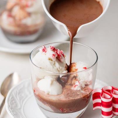 Photo: PEPPERMINT ICE CREAM AND HOT COCOA “AFFOGATO”  Have you heard of affogato? It’s an Italian word meaning “drowned” — usually referring to a dessert of ice cream drowned in hot espresso. It’s simplicity at its finest – and also one of my favorite ways to end a meal.  So you can imagine my delight when I saw on one of my favorite local restaurant’s menus (R bistro) — hot cocoa peppermint ice cream affogato. Peppermint ice cream drowned in hot chocolate? Oh, yes!  What You Need 14-ounce can regular coconut milk 14-ounce can light coconut milk ½ cup honey 1 teaspoon vanilla 2 teaspoons peppermint extract 3 tablespoons cocoa powder 2 tablespoons honey ¼ cup water ¼ teaspoon cinnamon 2 cups soy milk (or milk) Peppermint candies (a few for garnish)  What To Do A few hours prior to serving, make the ice cream: In a medium bowl, whisk together 2 cans coconut milk, ½ cup honey, 1 teaspoon vanilla, and 2 teaspoons peppermint extract. Freeze the mixture in an ice cream maker (or make it without the machine). When complete, freeze the ice cream for around 2 to 3 hours to obtain a hard texture.  In glass 2-cup measuring cup, place 3 tablespoons cocoa powder, 2 tablespoons honey, ¼ cup warm water and ¼ teaspoon cinnamon (if using). Microwave for about 20 seconds to heat briefly, then whisk or stir together until combined.  Add a bit of the soy milk and whisk it in to temper the mixture. Once it is incorporated, add the remainder of the 2 cups of milk. Microwave for 2½ to 3 minutes until hot, or for the stovetop method, heat the mixture over medium heat until hot, taking care that it does not boil.  To serve, crush the peppermint candies. Place a scoop or two of ice cream in a bowl or glass, then sprinkle with peppermint candies. At the table, pour hot chocolate over the ice cream. Enjoy!
