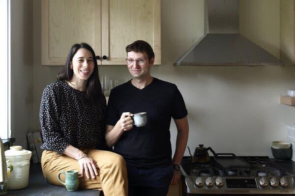 Emily Oppenheimer and Julian Agin-Liebes in their new Jersey City, N.J., home. After renting for a few years downtown, the couple focused their search on more residential neighborhoods, like the Heights. “We were like, ‘Why do we keep coming here to do the things we want to do? Let’s think about living here,’” Dr. Agin-Liebes said.