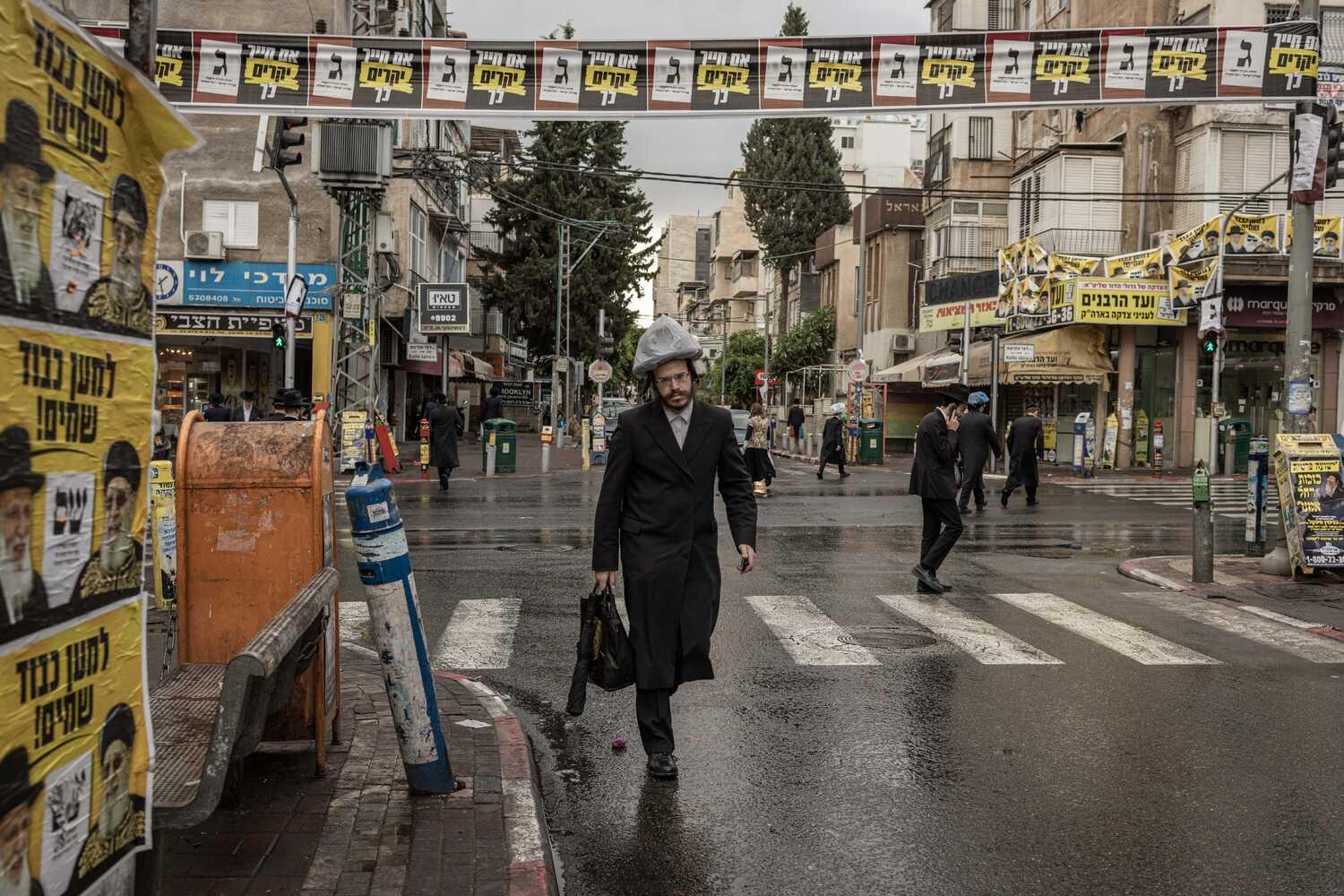 Election signs urging members of the Haredi community to vote for ultra-Orthodox parties in November in Bnei Brak, Israel.