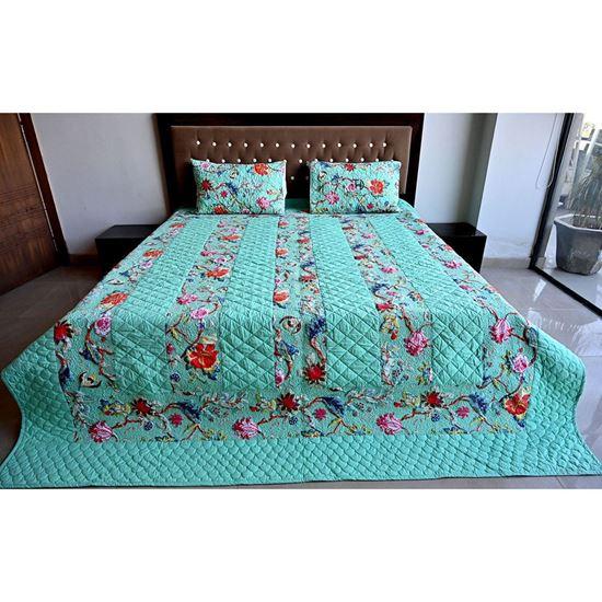 Floral quilt with hand block print (Size 270x220 cms) with 2 pillow cover of the same design with cotton Fabric. The quilt is made of 3 layers i.e fabric, cotton sheet & fabric then all 3 are quilted together. It can be used as a bedsheet also to rock bedroom.