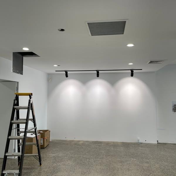 Track lighting installation in a newly constructed room by a professional electrician in Adelaide, showcasing expert electrical installations and innovative smart lighting solutions.
