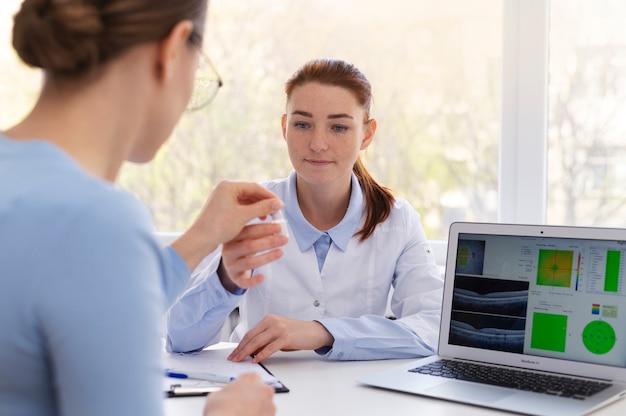 Doctor testing patient eyesight