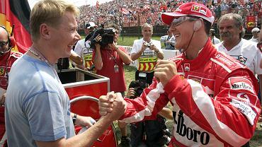Michael Schumacher i Mika Hakkinen przed rozpoczęciem Grand Prix Węgier w 2005 roku.