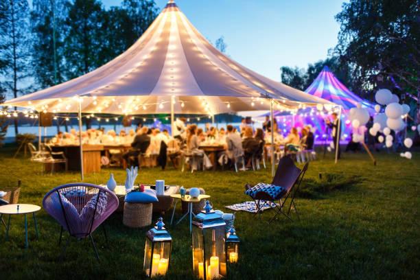 Colorful wedding tents at night Colorful wedding tents at night. Wedding day. party rentals stock pictures, royalty-free photos & images