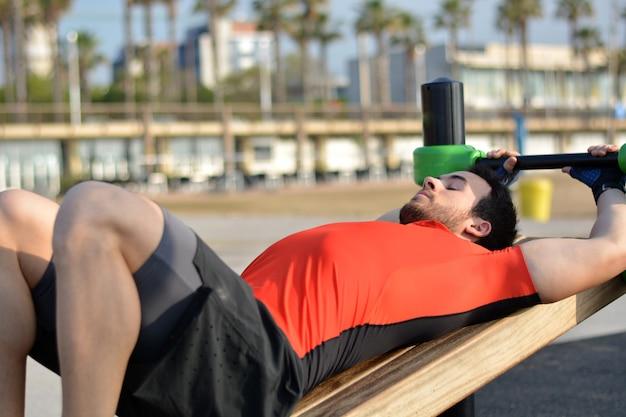 Athlete practicing exercises of calisthenics