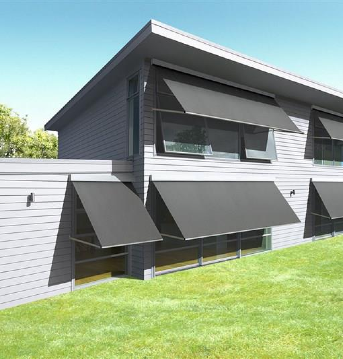Modern house with sleek black awnings by Betta Blinds covering large windows, showcasing high-quality awnings Adelaide including pivot arm awnings, folding arm awnings, and outdoor awnings systems for stylish shade solutions.