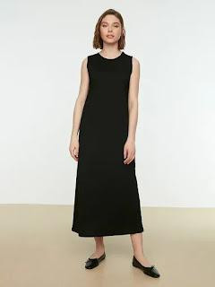 Black Solid A-Line Dress Details • Round neck. • Sleeveless, no sleeves. • Midi length in straight hem. • Model is 5’8″ tall. • Material: Cotton. • Care: Machine wash. • Occasion: Casual, knit or woven.