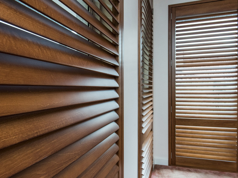 Elegant timber plantation shutters by ASI Security, enhancing privacy, light control, and style in homes across Adelaide.