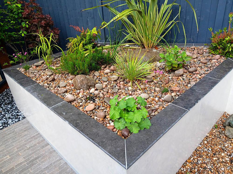 landscapegardenerssolihullexamplewithraisedbordersandplantingscheme.jpg