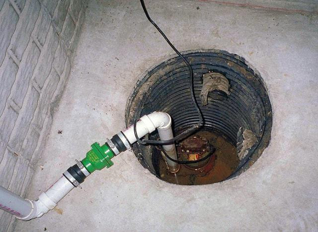 ajax-basement-waterproofing-sump-pump-installation-1_orig.jpg