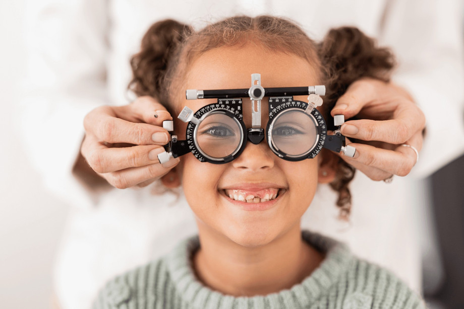 imgi_23_eyeexamwithsmilingchild1.jpeg