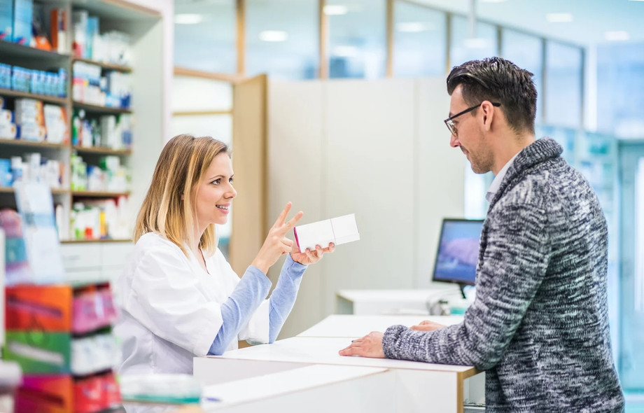 imgi_33_femalepharmacistservingamalecustomer.jpeg