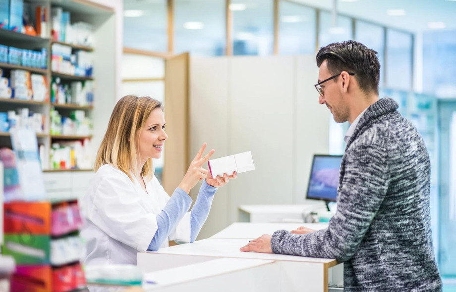 imgi_28_femalepharmacistservingamalecustomer.jpeg