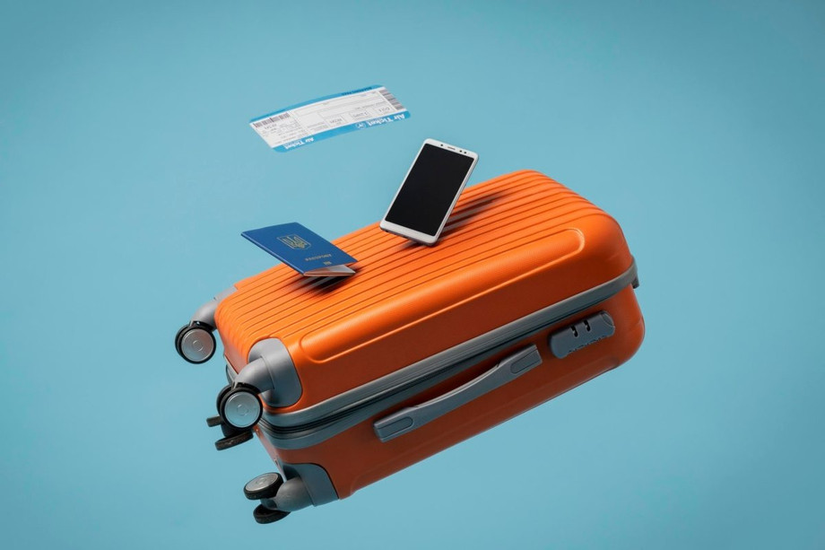 luggagetravelconceptwithbaggagepassportscaled.jpg