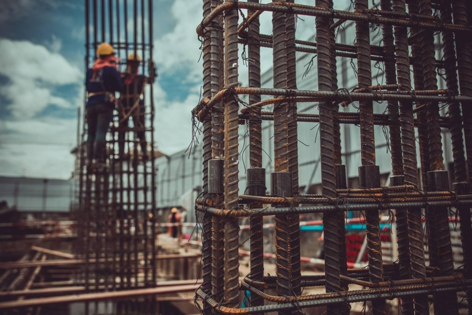 stockphotoreinforcedconcreteandtheworkersbehindthescenesareunderconstruction1112516852transformedcopy.jpg