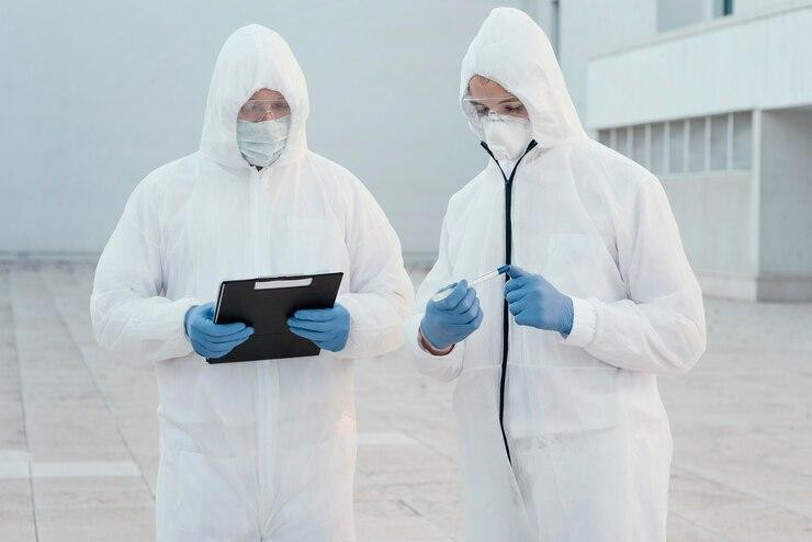 peoplewearingpreventionsuitsagainstbiohazard_232148849814.jpg