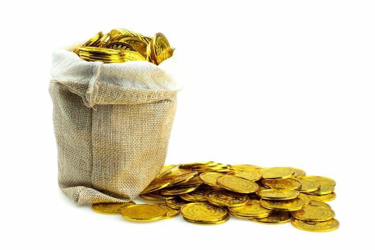 stackinggoldcointreasuresackwhitebackground_1851261092.jpg