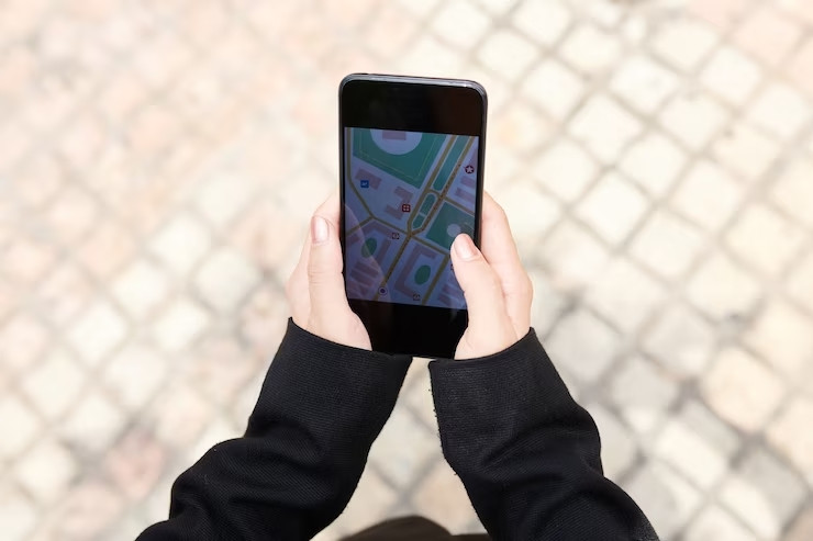 closeupunrecognizablewomancheckinggeolocationphoneappwhileplanningroute_27468925234_1_.jpg