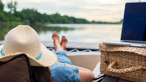 workfromstayselfcateringwomanrestingbylake.jpg