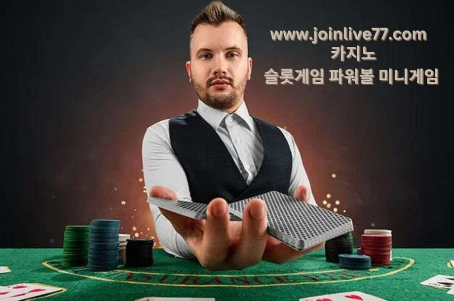 Casino evolution dealer holding a cards, and casino chips and cards placed on the table