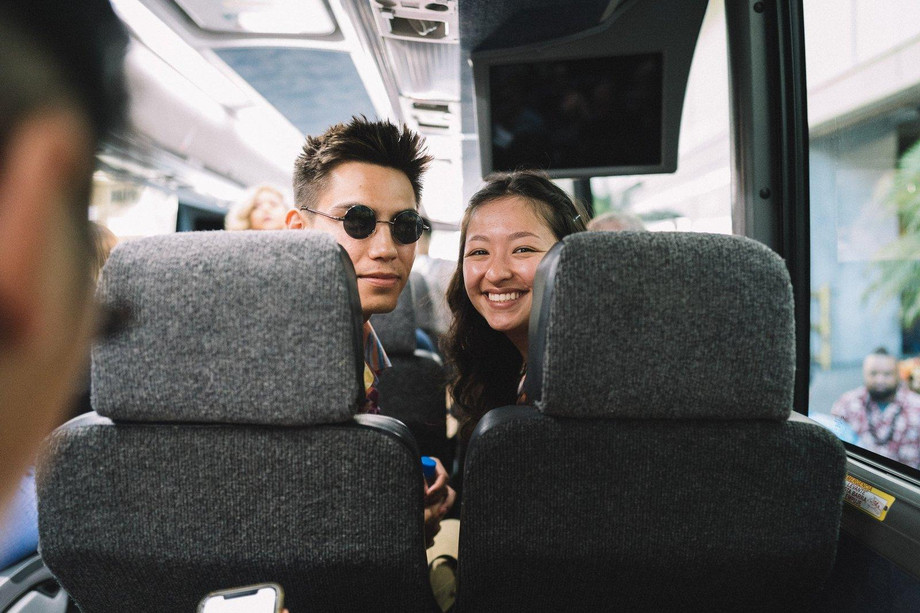 youngcoupletravelingonabus.jpg