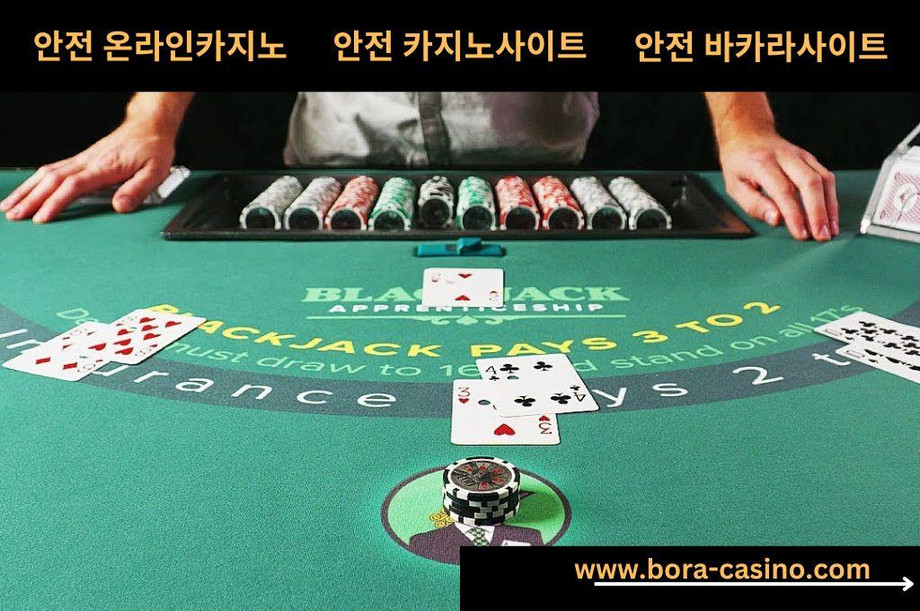 green blackjack table with chips and cards leads by the dealer.