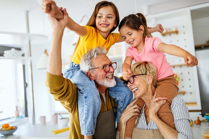 promomanwomantwochildrenpiggyback850x567.jpg