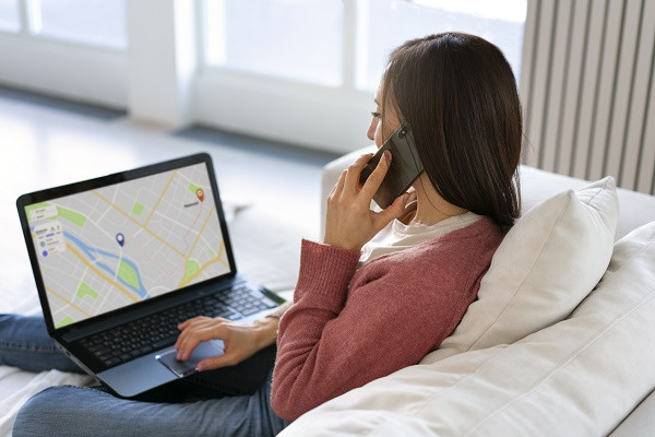sideviewwomanholdinglaptop.jpg