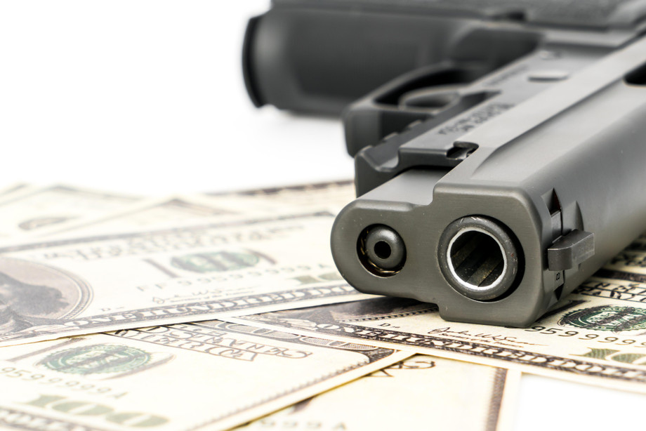 closeupimagepistoldollar.jpg