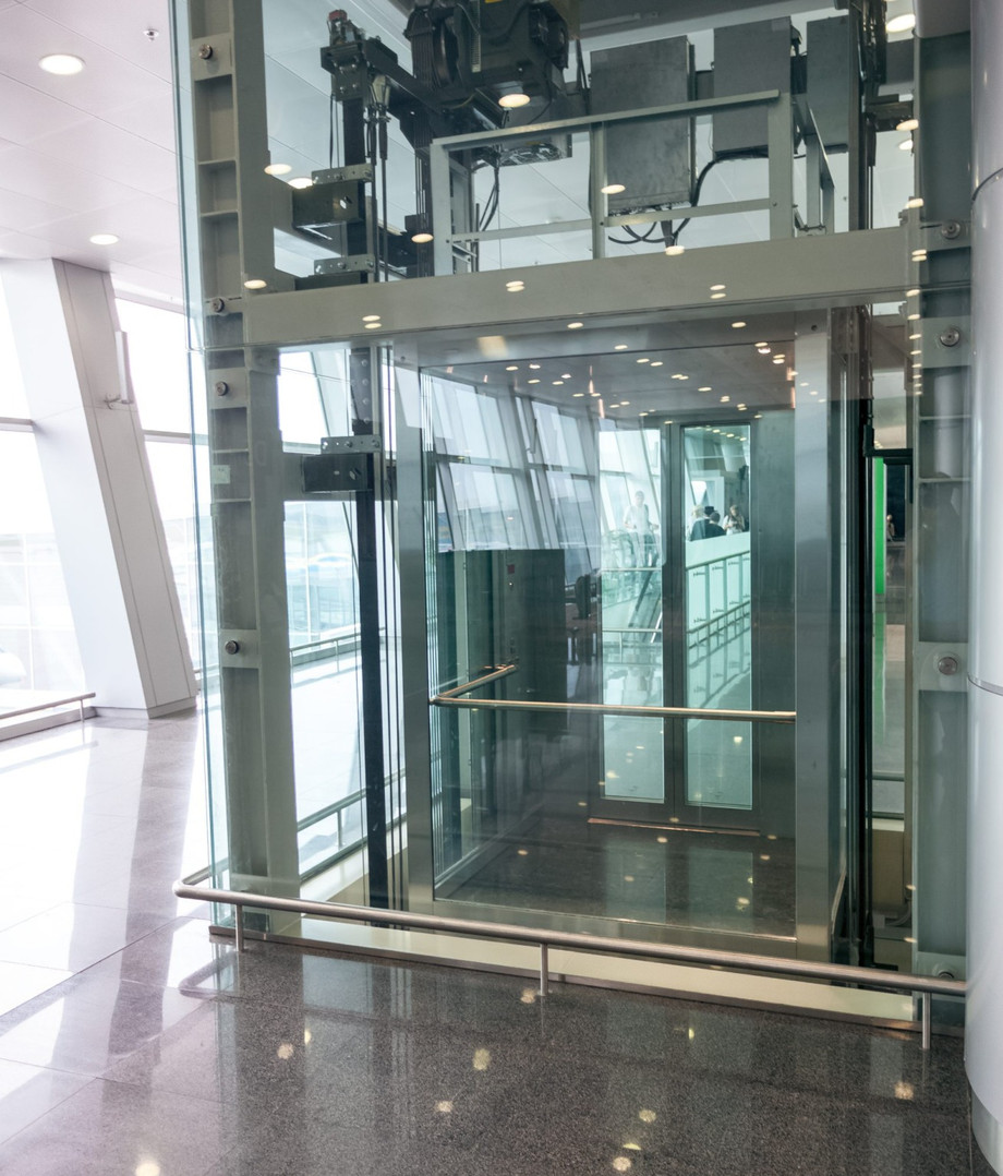 imageye____imgi_73_modernglasselevatordisabledpeopleinternationalairportscaled11311x1536.jpeg