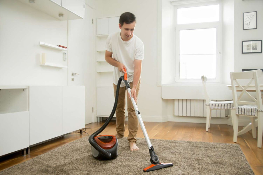 happysmilingmancleaningcarpet1.jpg