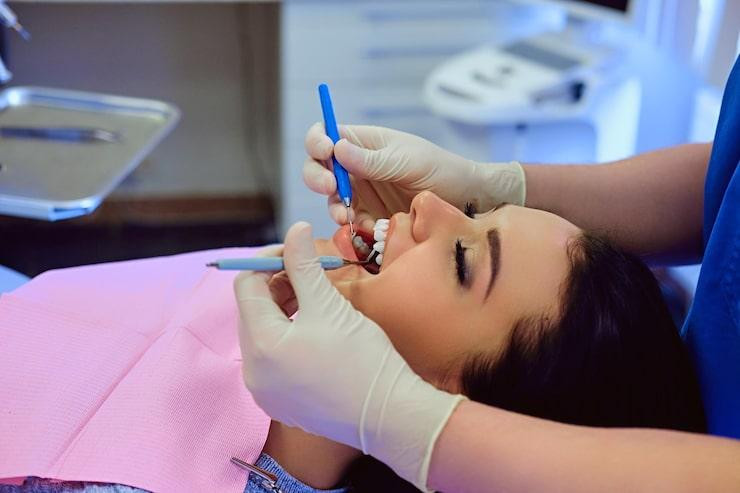 closeupimagedentistexaminingfemalesteethdentistry_61391015279.jpg