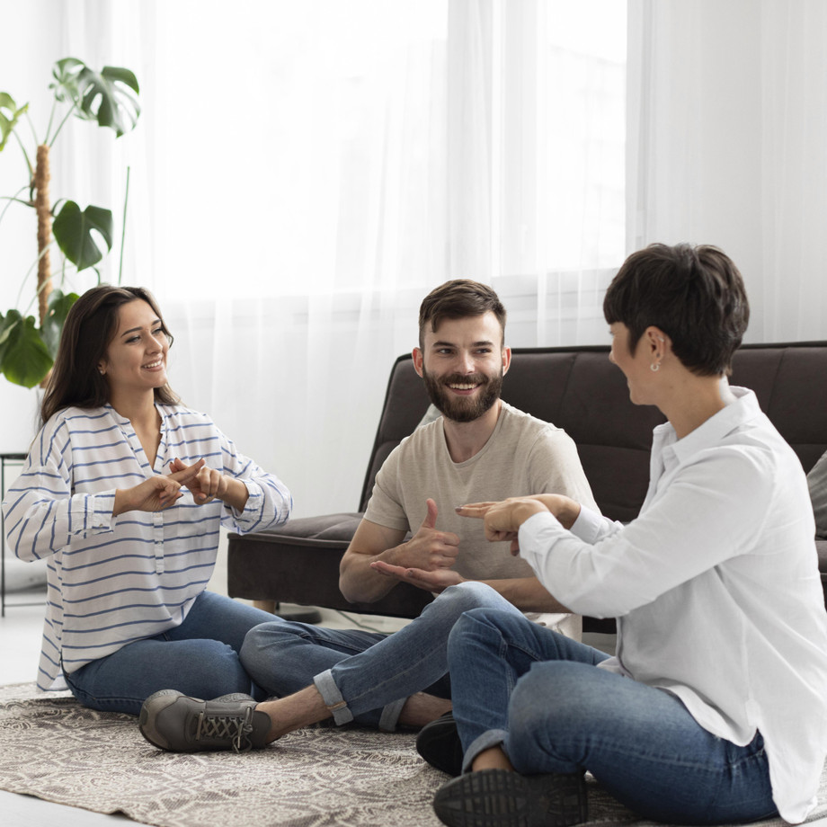 groupdeafpeoplecommunicatingthroughsignlanguage.jpg
