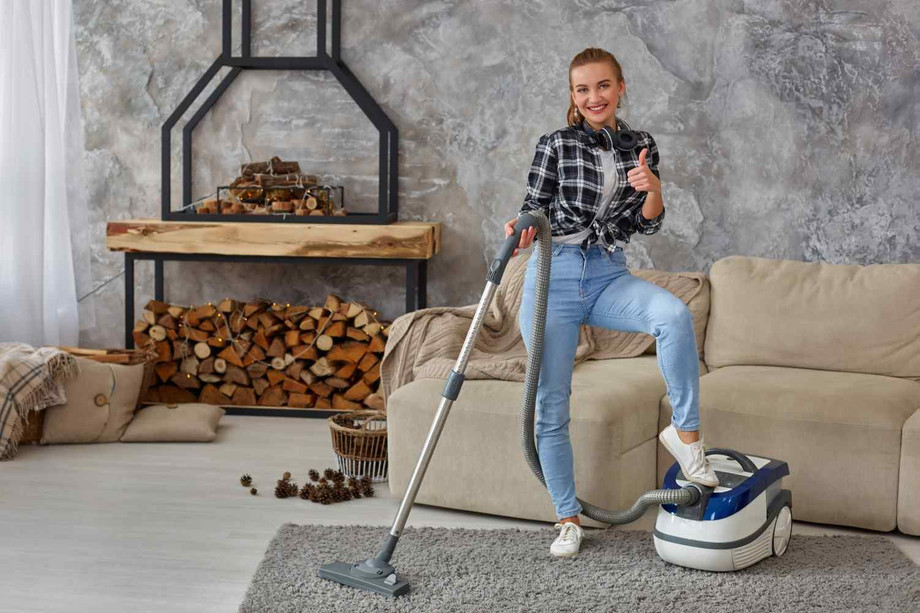 slimwomancleaningwithvacuumcleanercarpethousebusycleaningdayhomehousekeepingconcept1.jpg